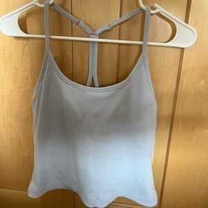 Light blue workout top with adjustable straps & padding  size medium